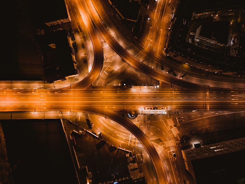 time lapse photography of cars on road during night time