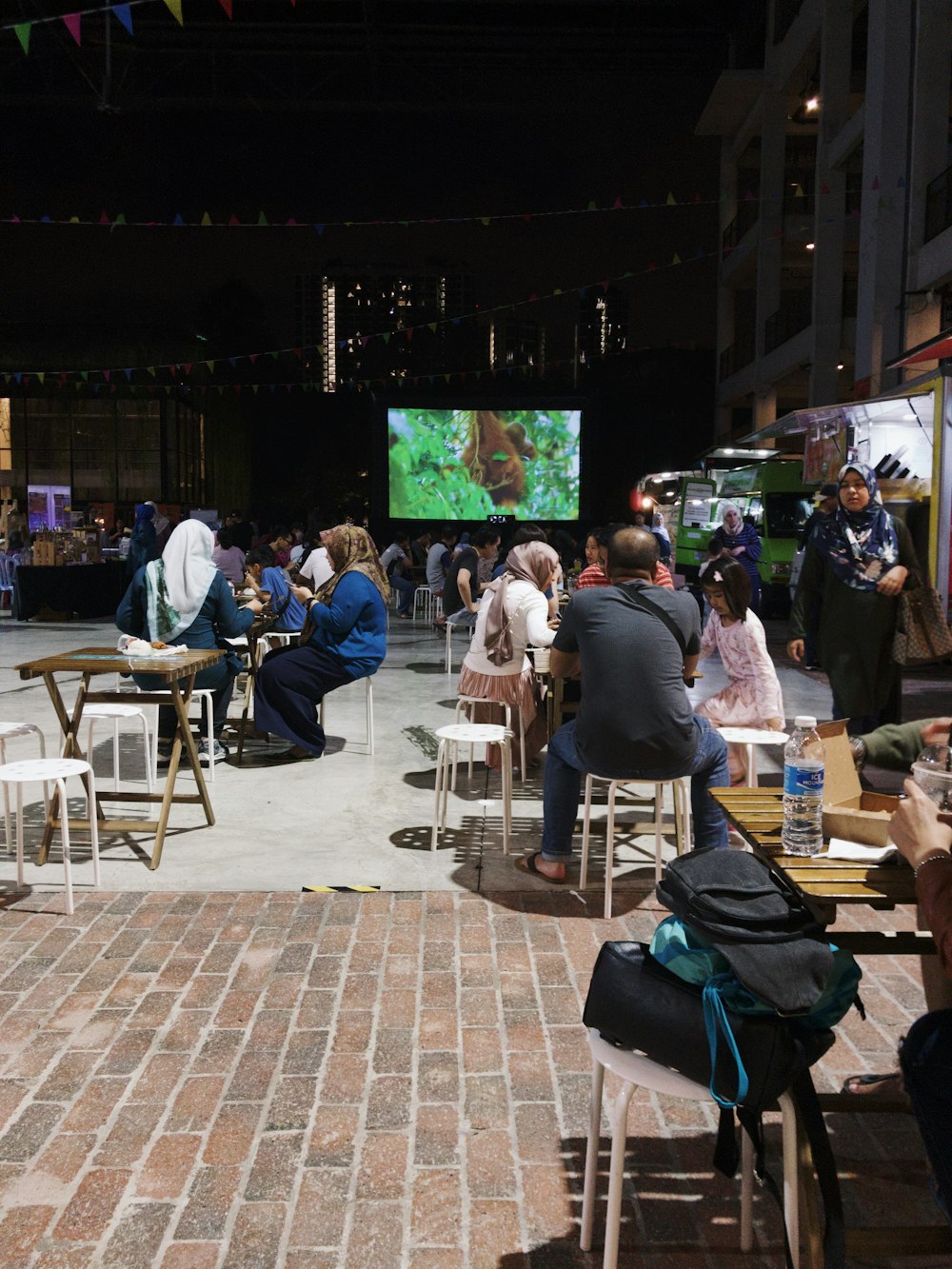 a group of people sitting around a table