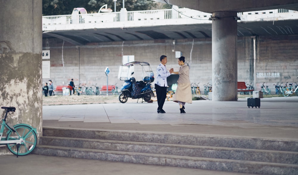 people walking on sidewalk during daytime