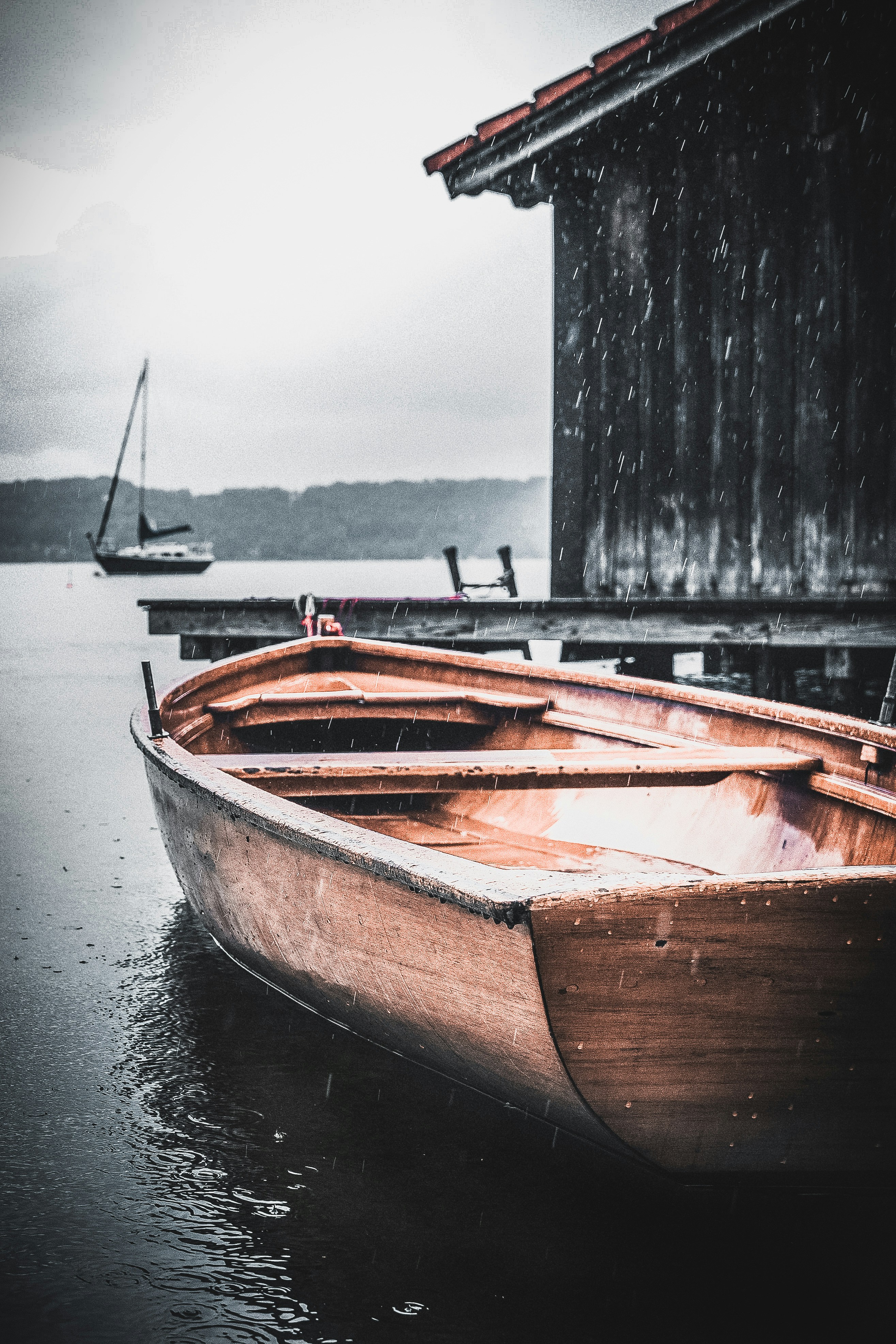 brown and white boat on water