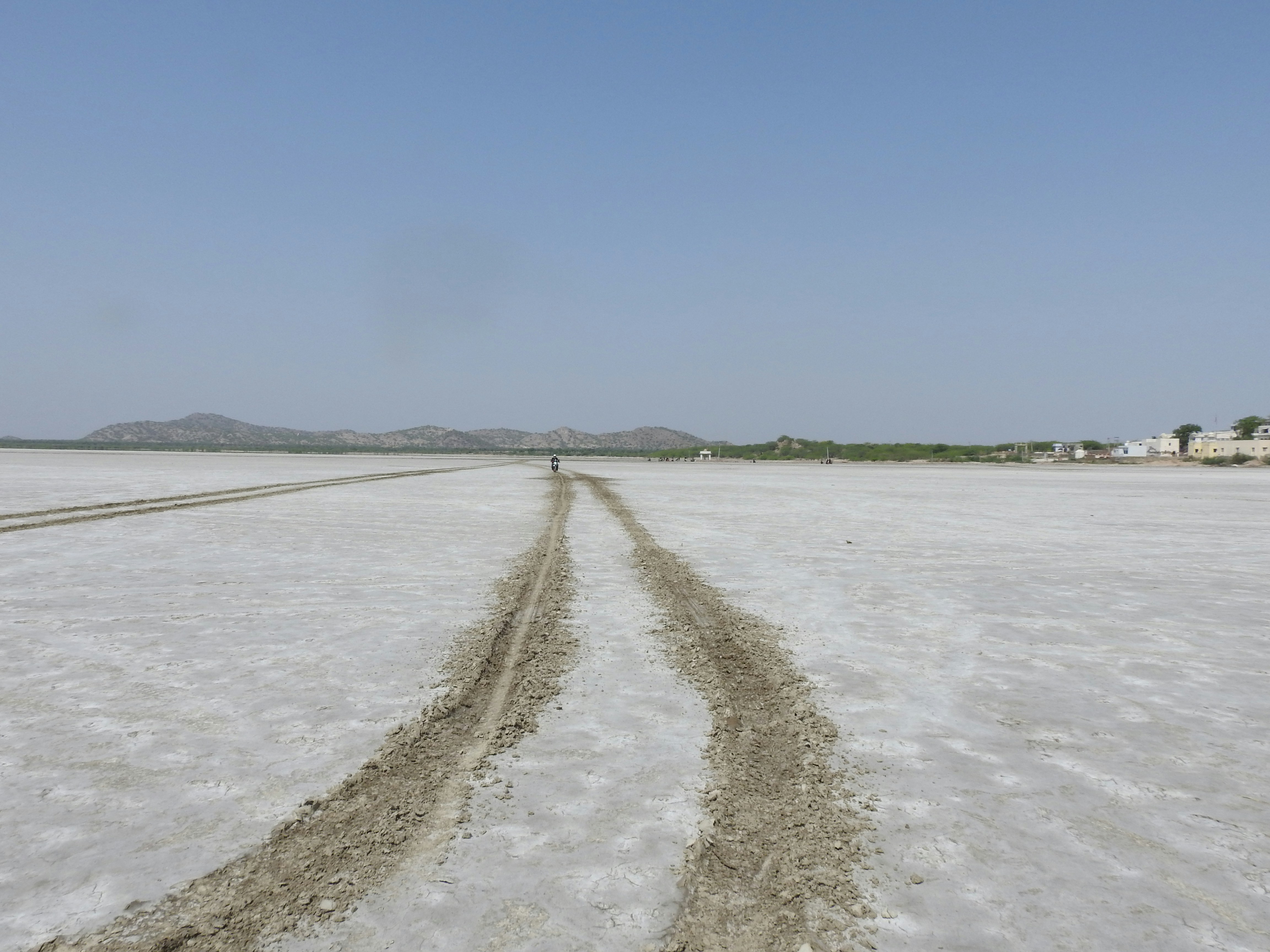 white sand beach during daytime