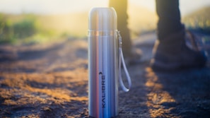 Close-up of a customized stainless steel thermos with vibrant digital print.