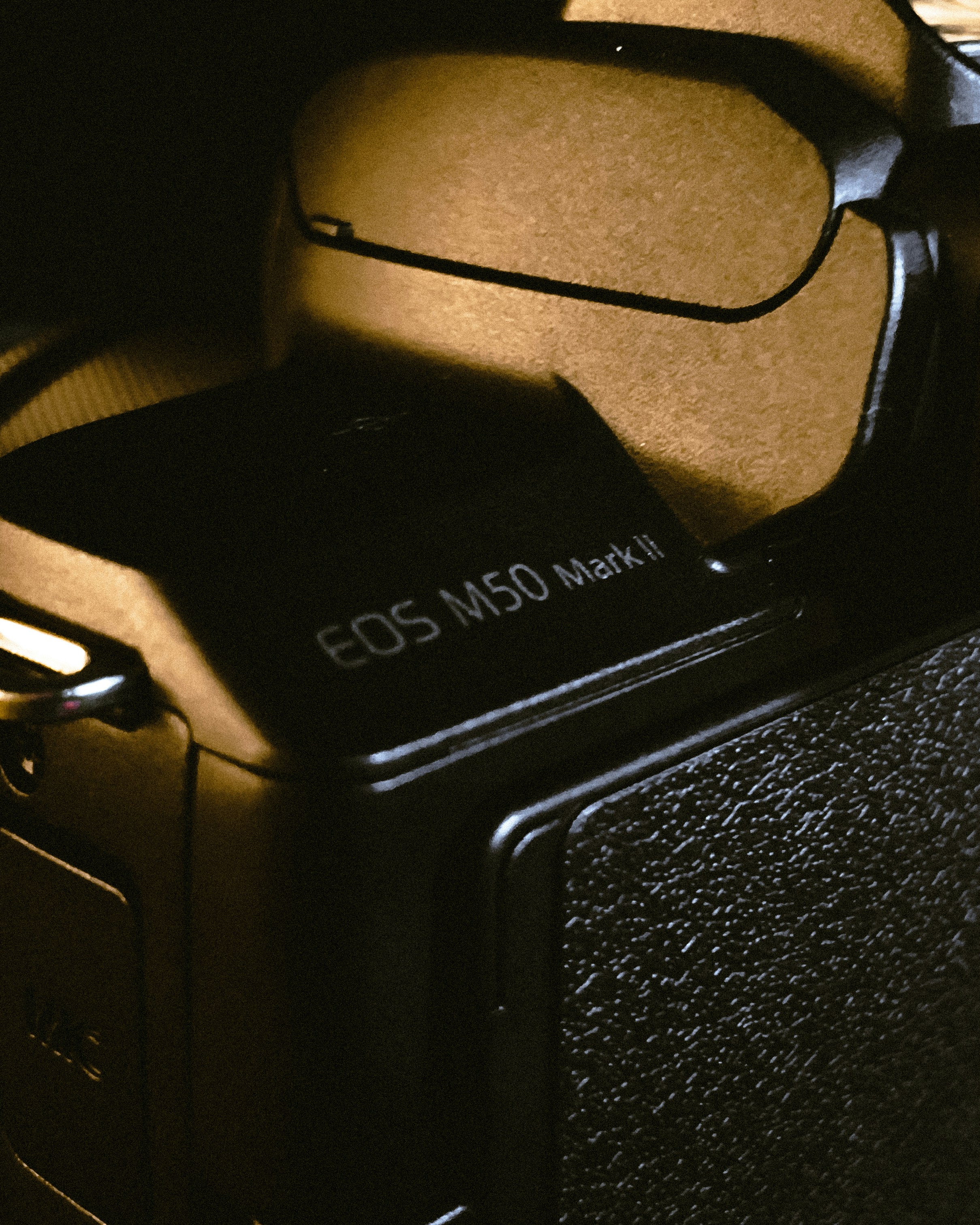 Black Canon EOS M50 Mark II mirrorless camera with lens attached