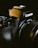 Close-up of a professional DSLR camera with artistic lighting background