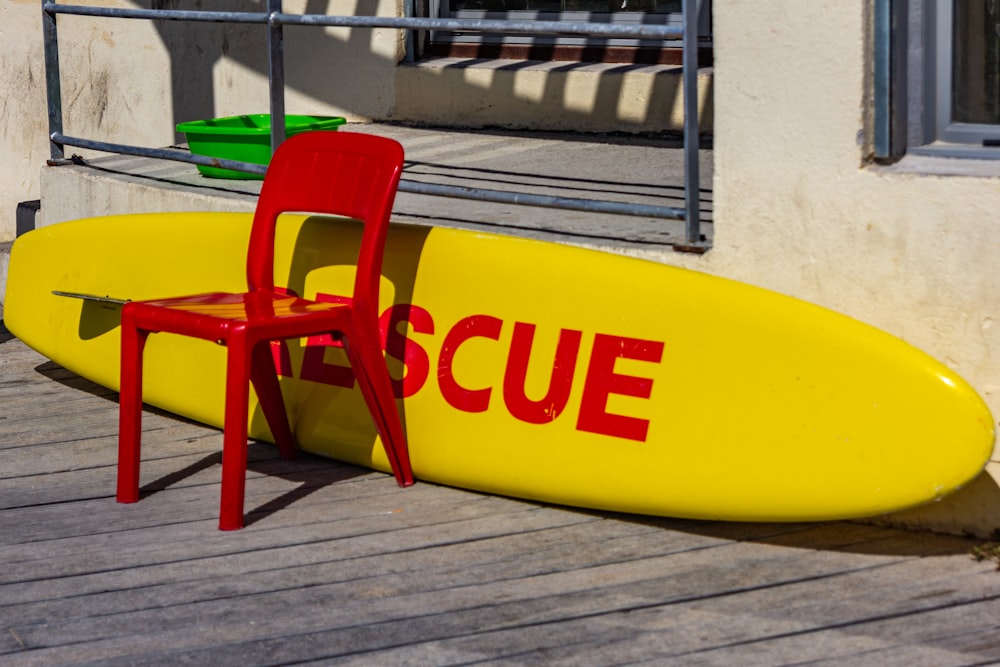 yellow and red plastic chair