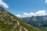 A scenic mountain view from a hiking trail video.