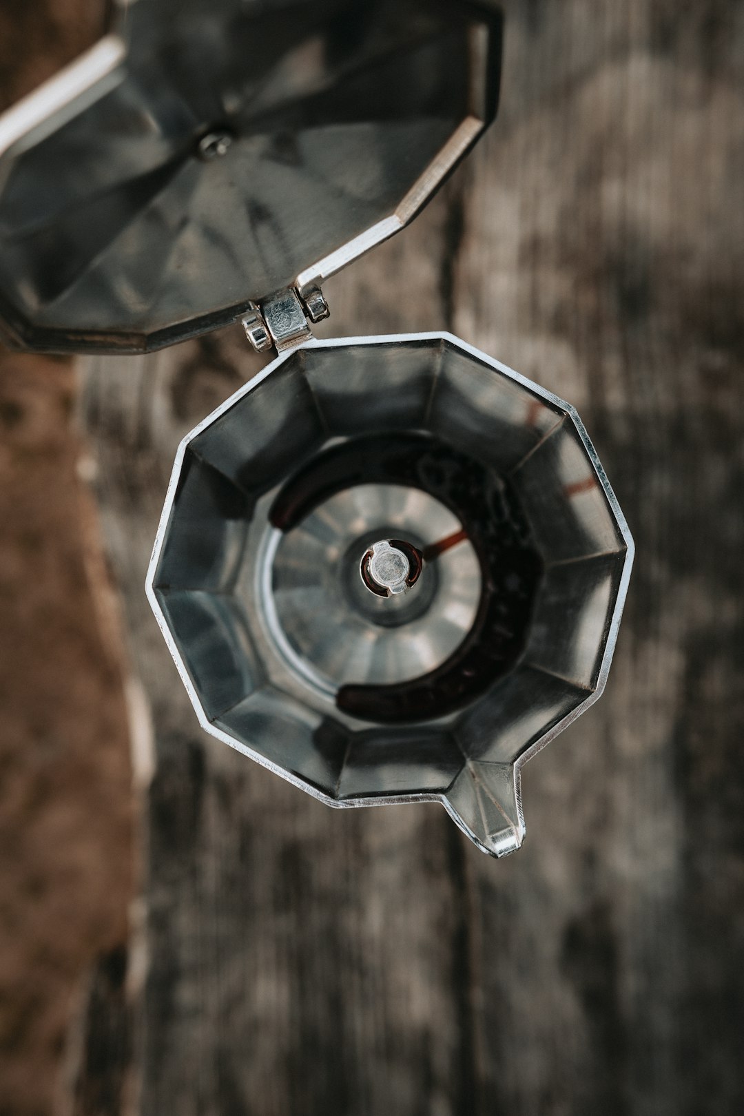 silver and black round pendant