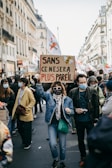 Volunteers distributing health awareness leaflets during a community event in France.