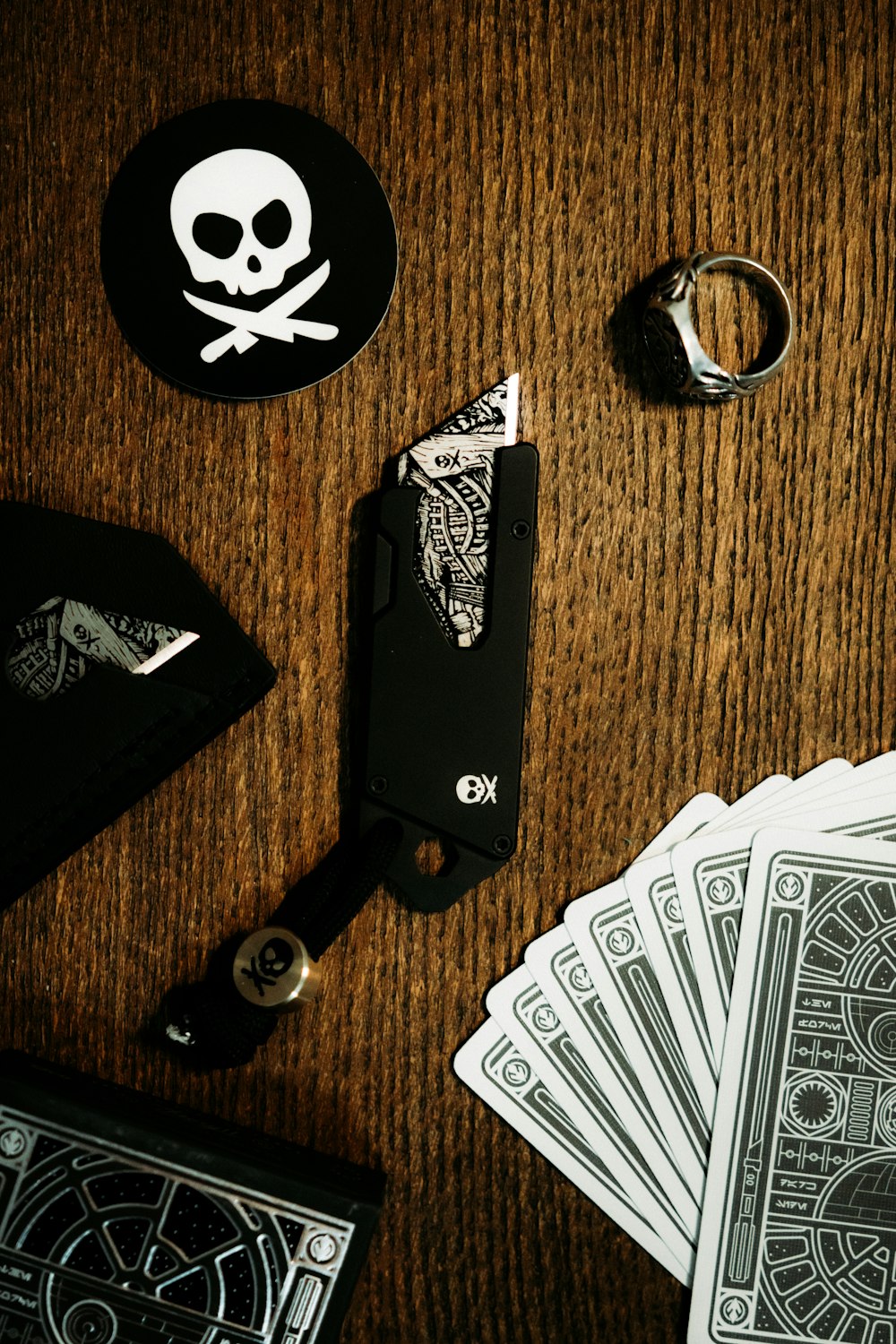 black and silver key on brown wooden table