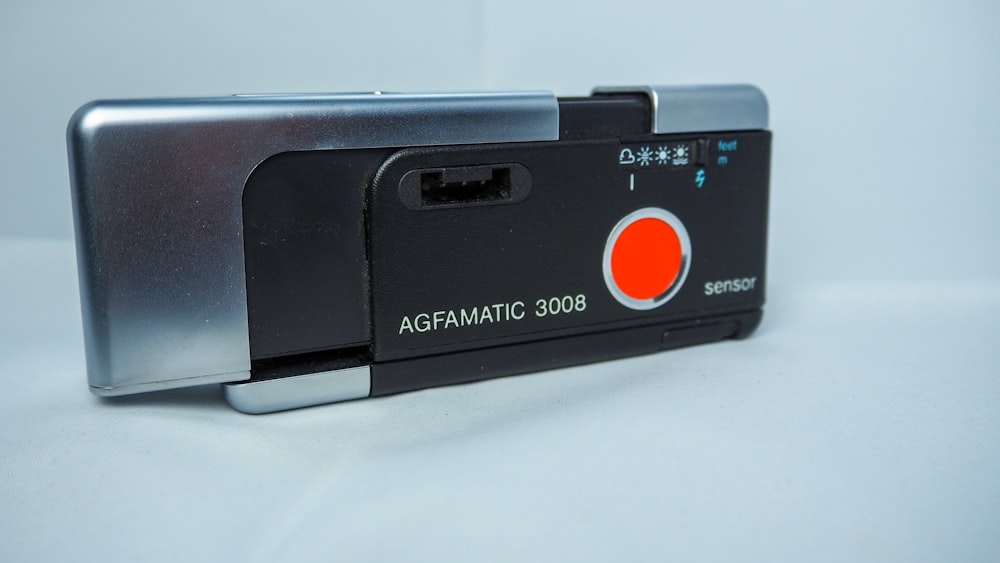 black and gray polaroid camera