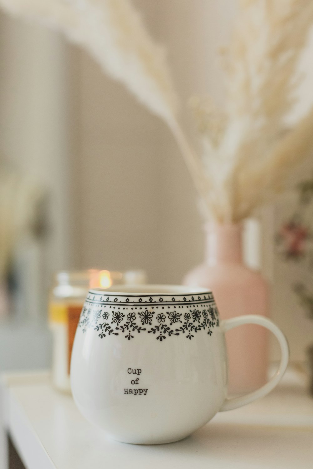 white ceramic mug with white liquid inside