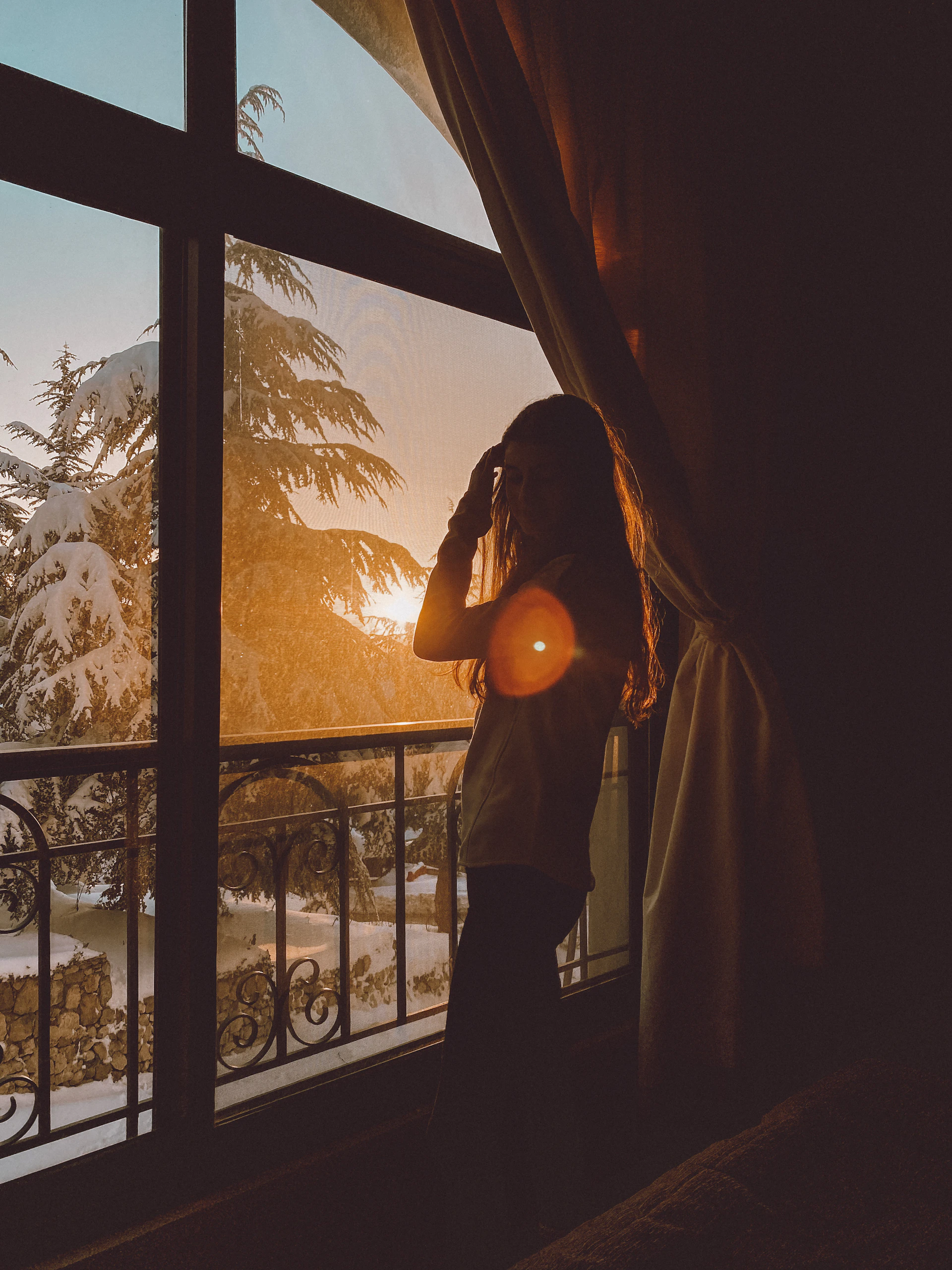 woman holding dried flower
