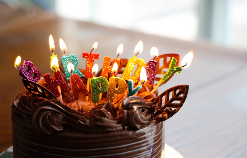 chocolate cake with happy birthday candles