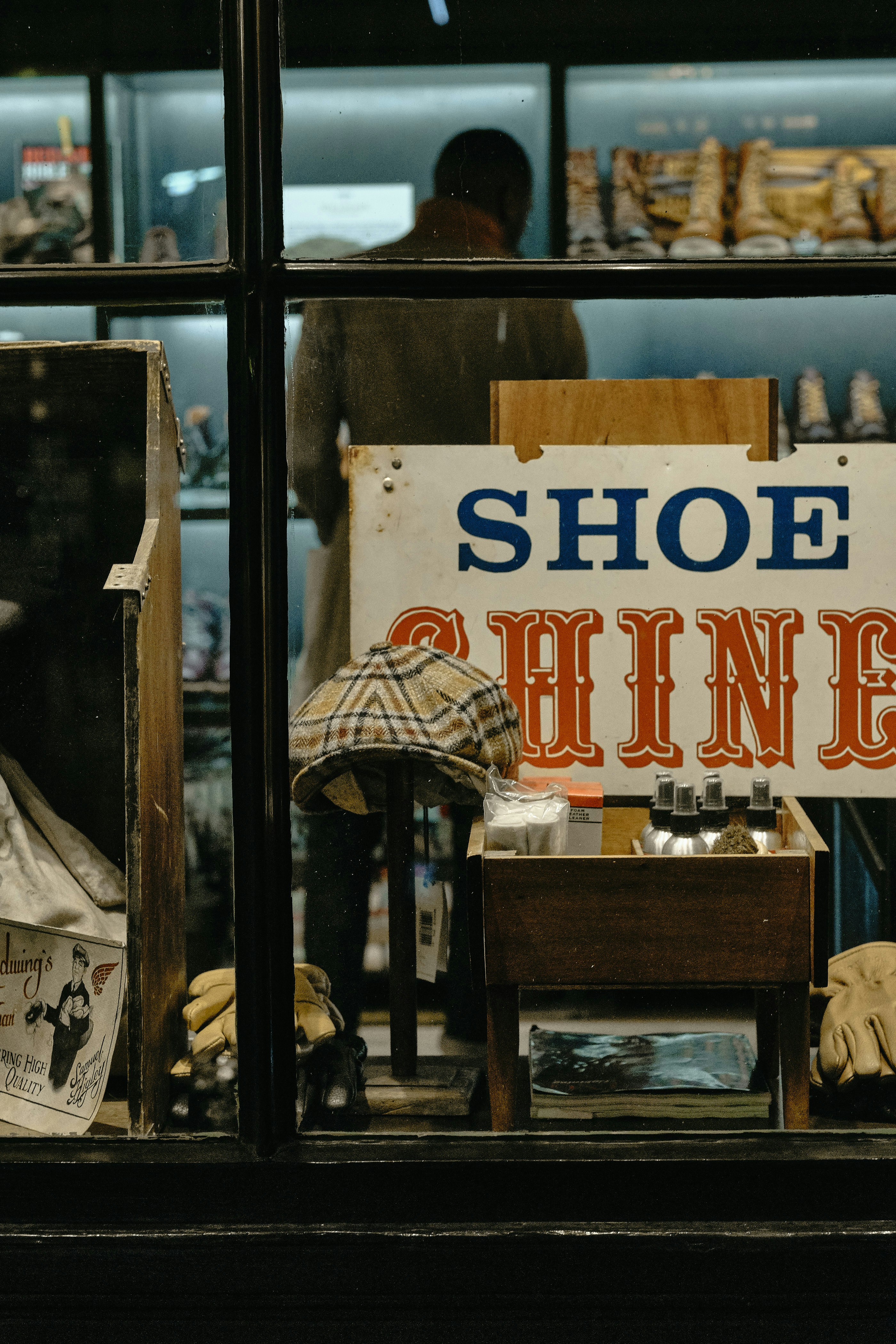 brown wooden table with white and red stripe umbrella