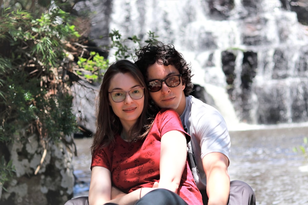 woman in white t-shirt beside woman in red shirt