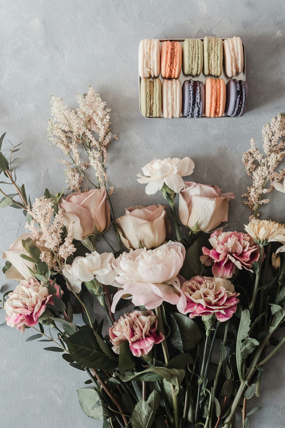 pink and white roses and white babys breath flowers