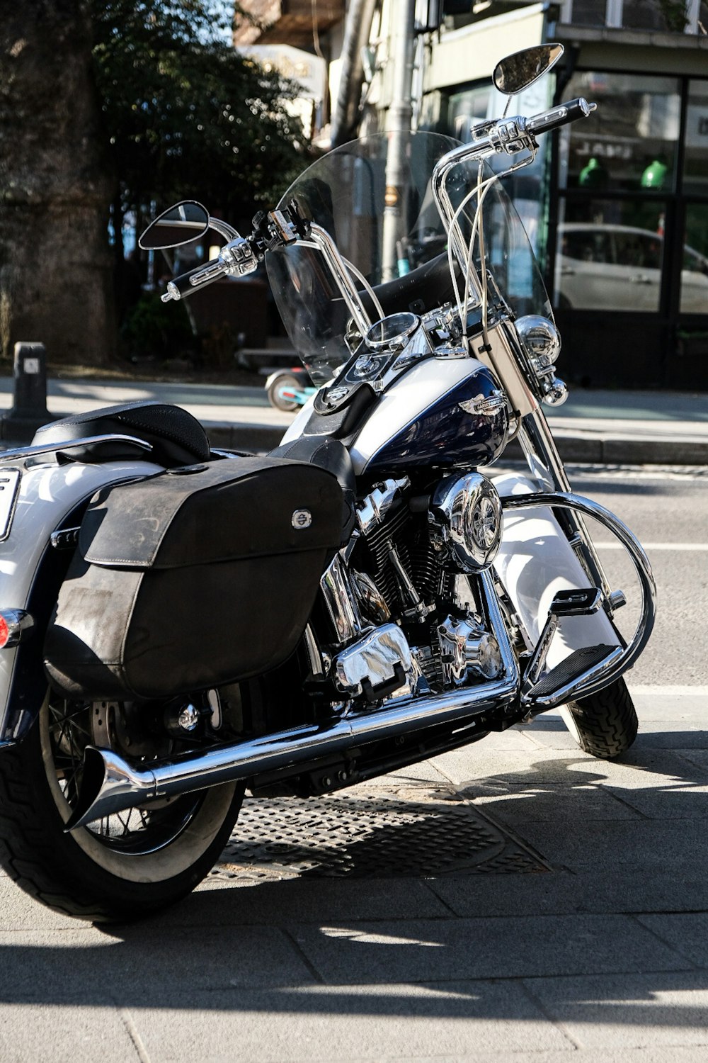 black and silver cruiser motorcycle on road during daytime