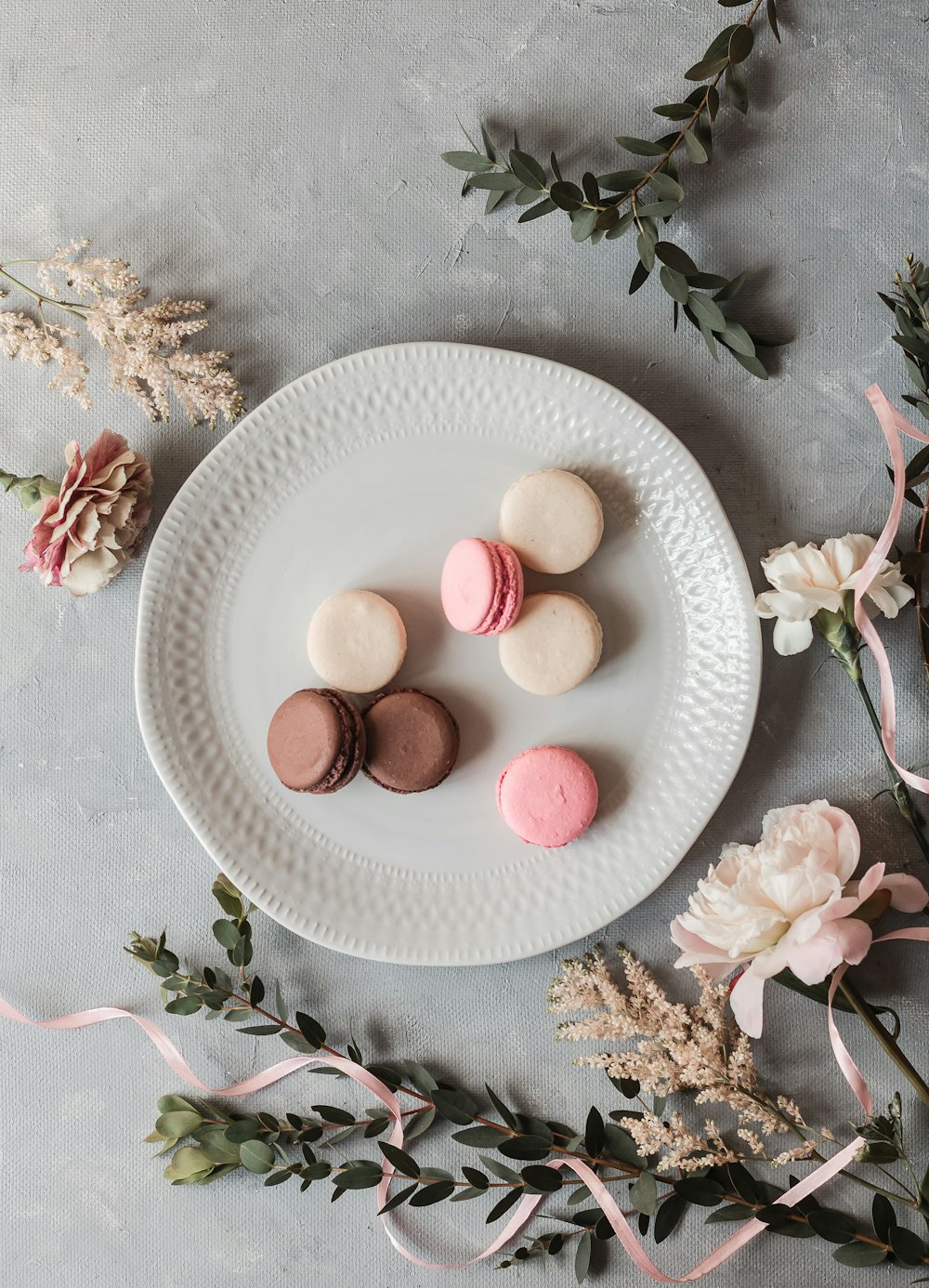 pink and white eggs on white ceramic plate