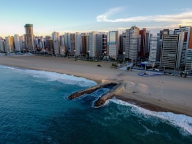 high rise buildings near sea during daytime