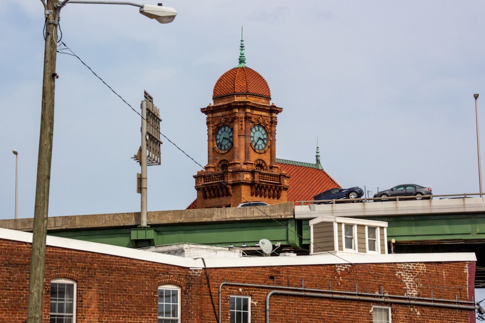 brown and green concrete building under white sky during daytime