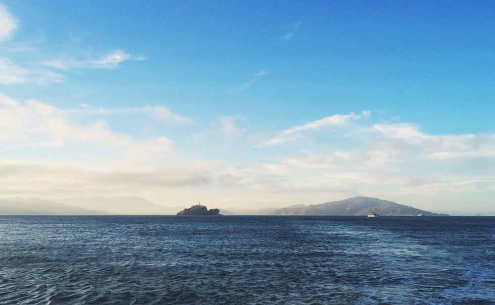 blue sea under blue sky during daytime