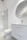 Close-up of a stylish bathroom featuring new tile work and a sleek vanity installed by nexaforma.