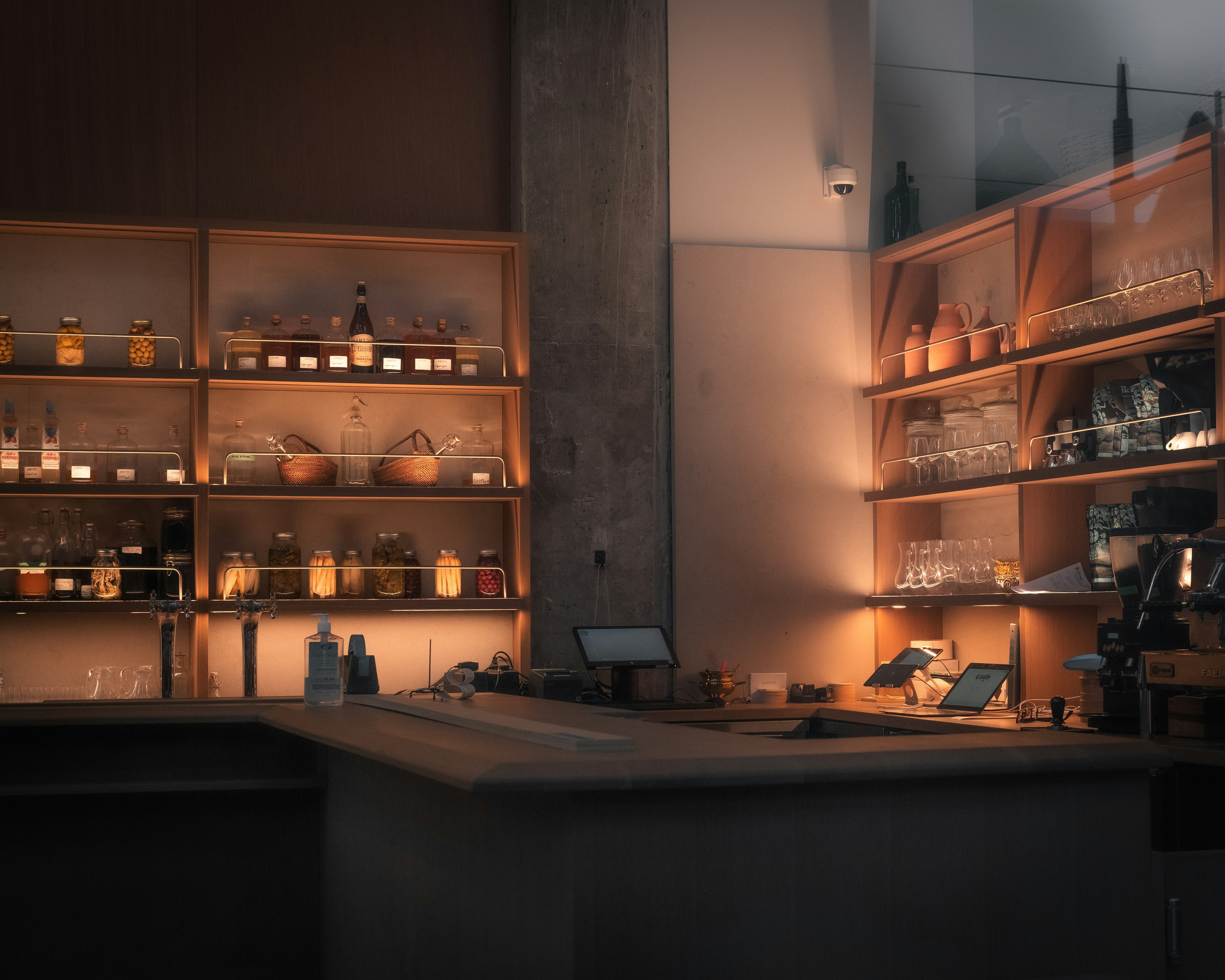 brown wooden shelf with bottles