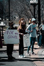 people walking on sidewalk during daytime