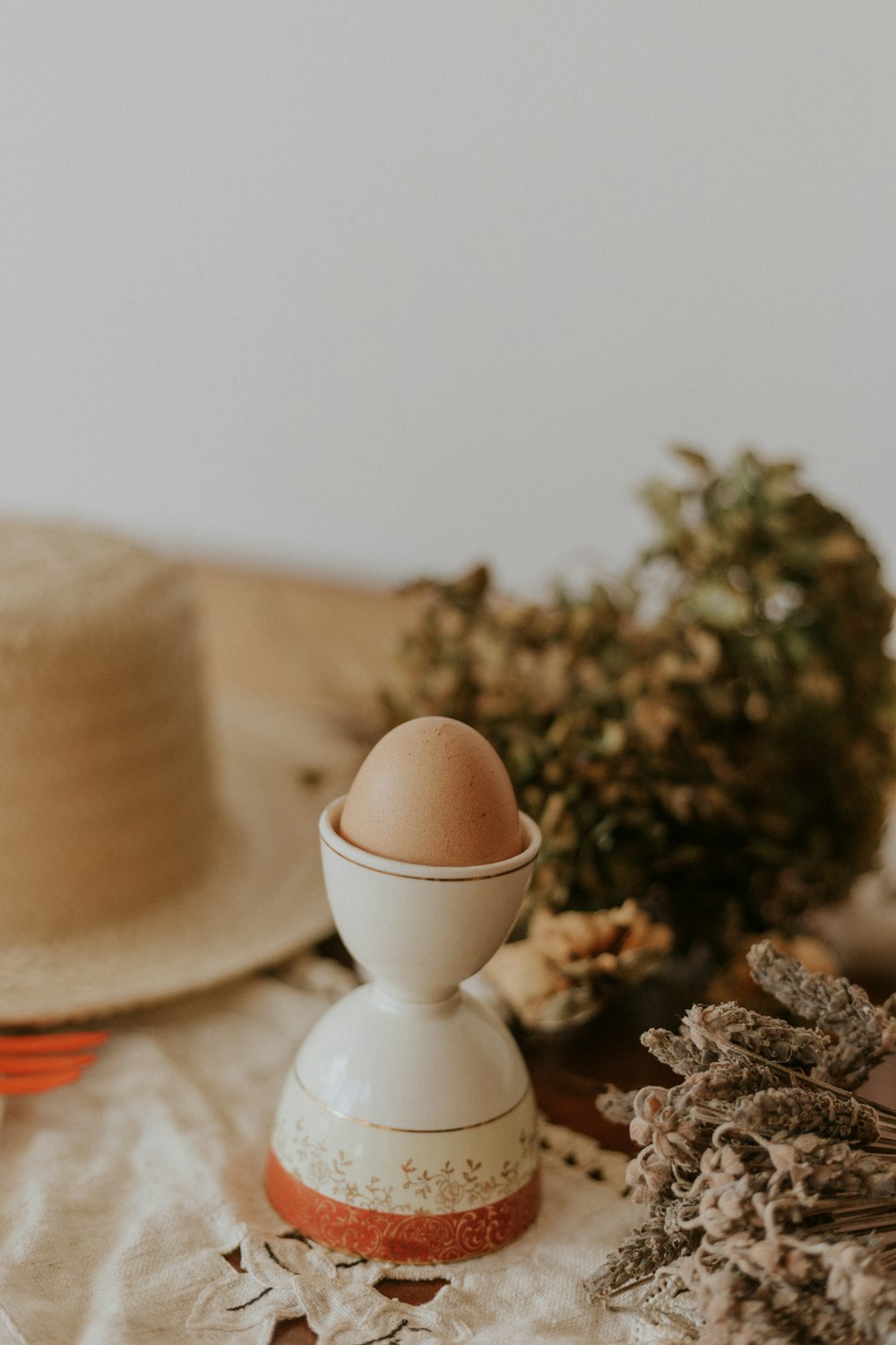 white ceramic vase on white table