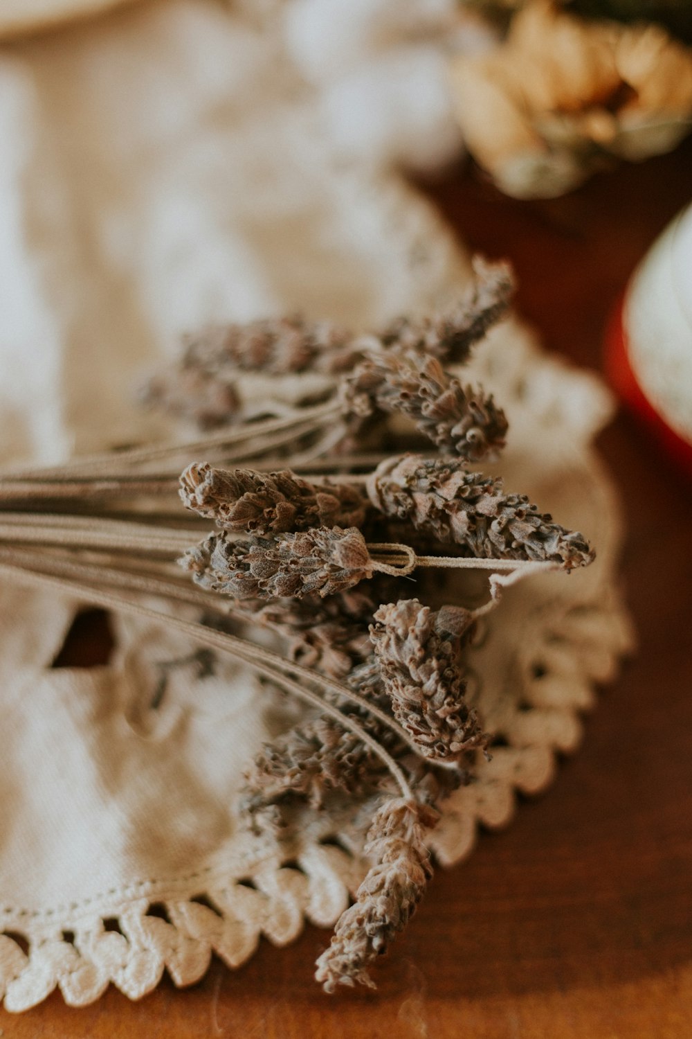 silver spoon on white textile