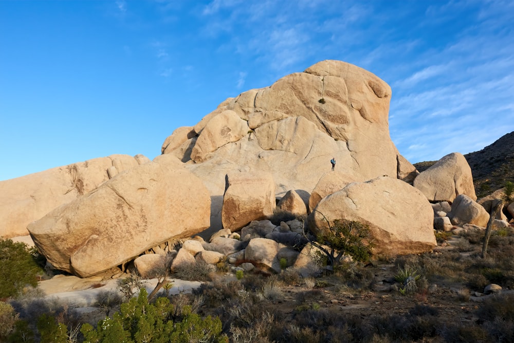 brown rock formation under blue sky during daytime