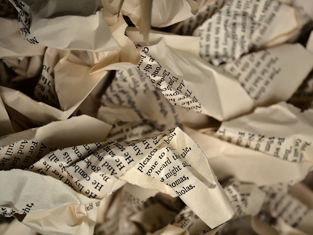white and black printed paper, Crumpled Pages from a Book