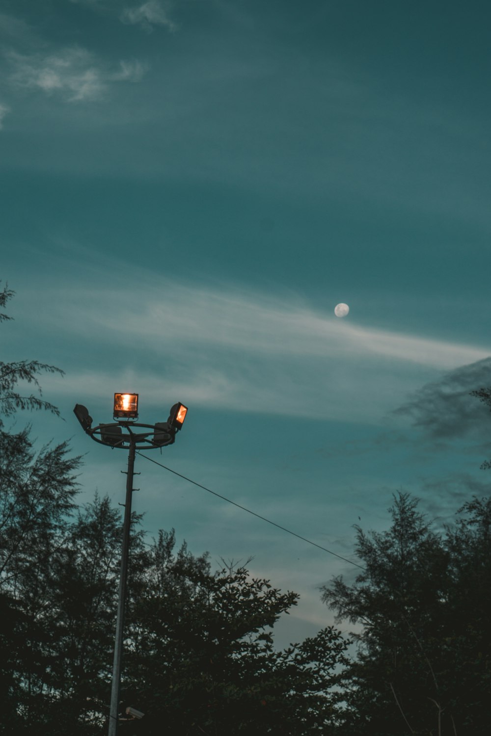 Black street light turned on during night time photo – Free Grey Image on  Unsplash