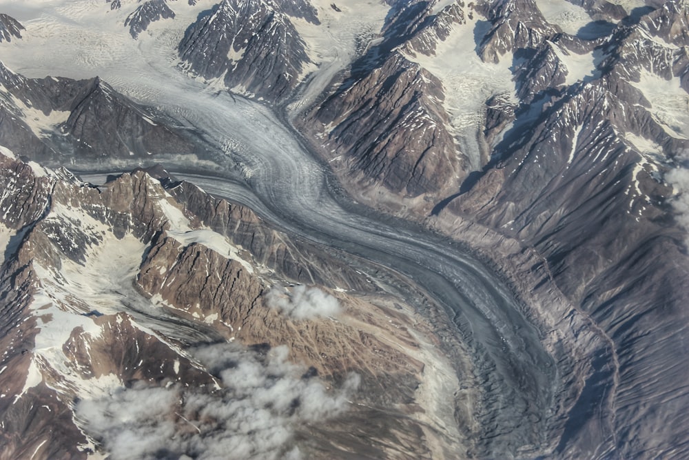 aerial view of brown and white mountains