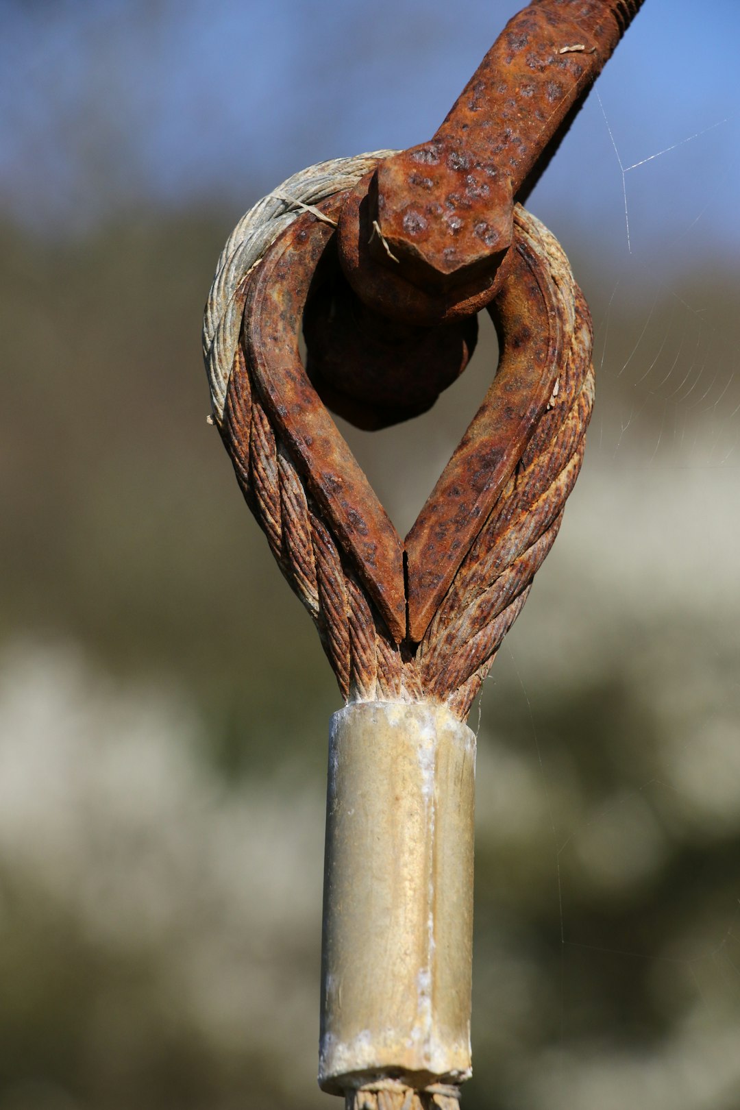 brown metal chain with brown metal padlock