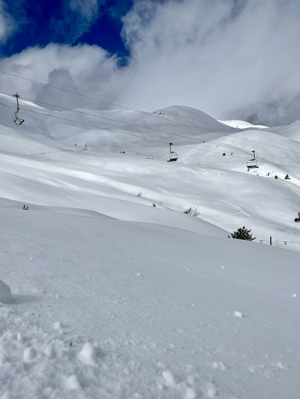 snow covered mountain under blue sky during daytime