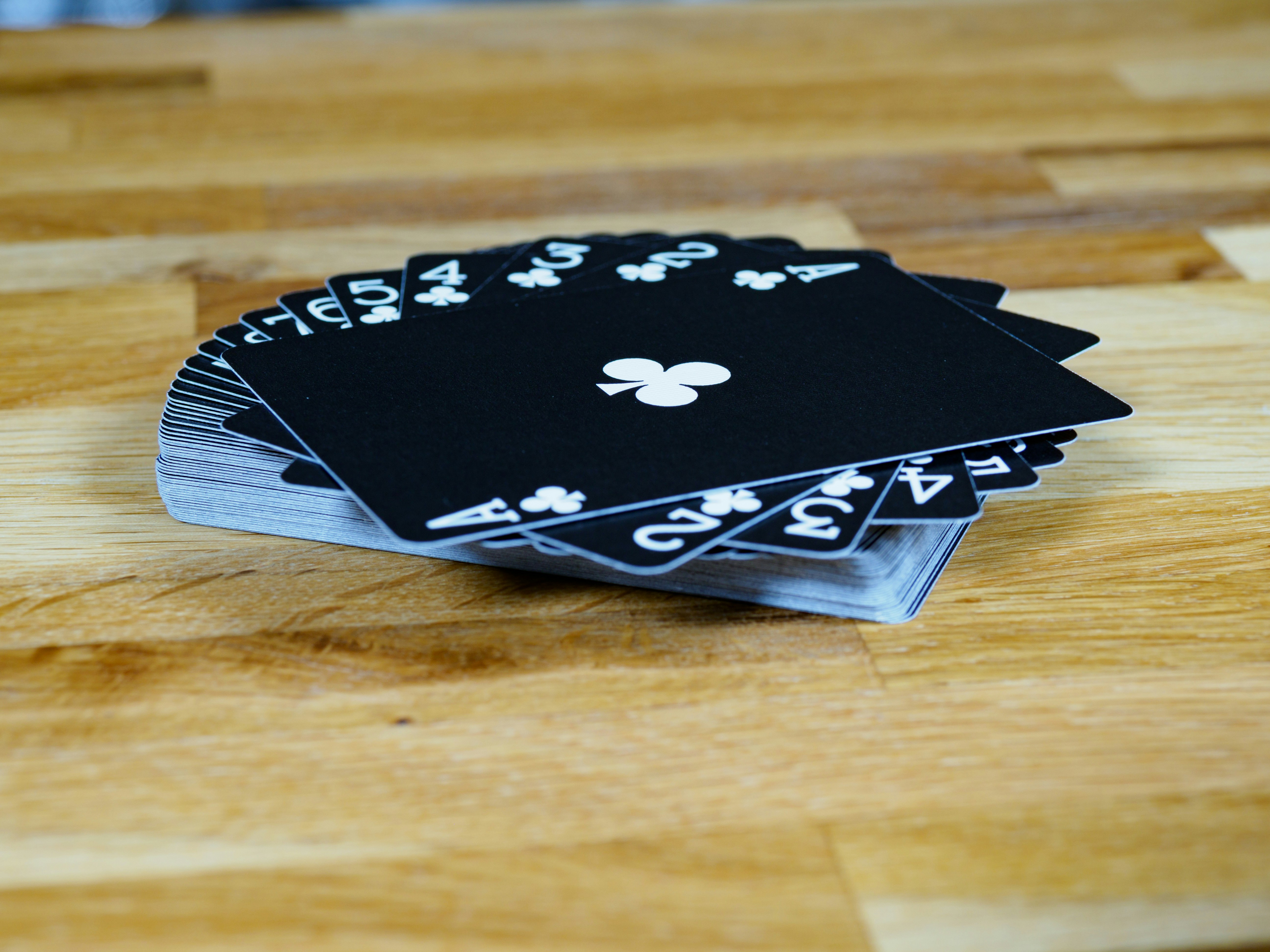 cards, playing cards, gambling, close up, bokeh, wood background, product shot, focus, deal, ace of clubs,</p>
<p>” style=”max-width:440px;float:left;padding:10px 10px 10px 0px;border:0px;”></p>
<div class=