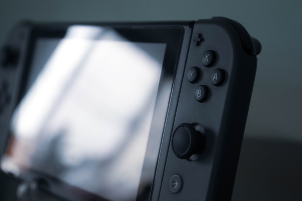 black and gray nintendo switch