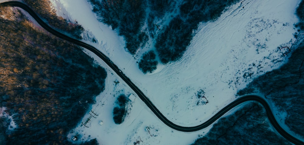 birds eye view of road in the middle of the sea