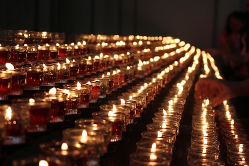 Rows of candles lined up on a factory production line in Vietnam.