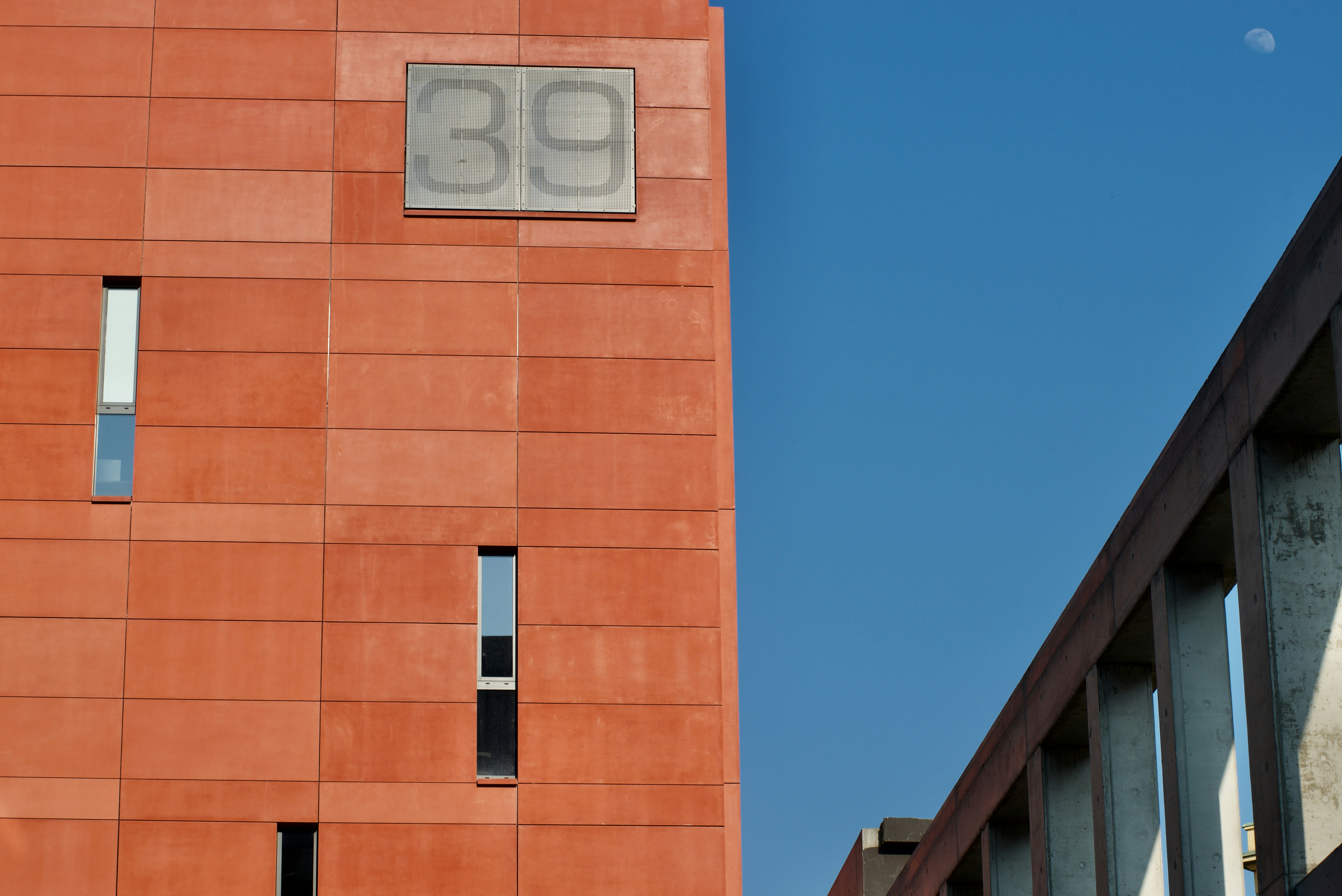 brown brick building under blue sky during daytime