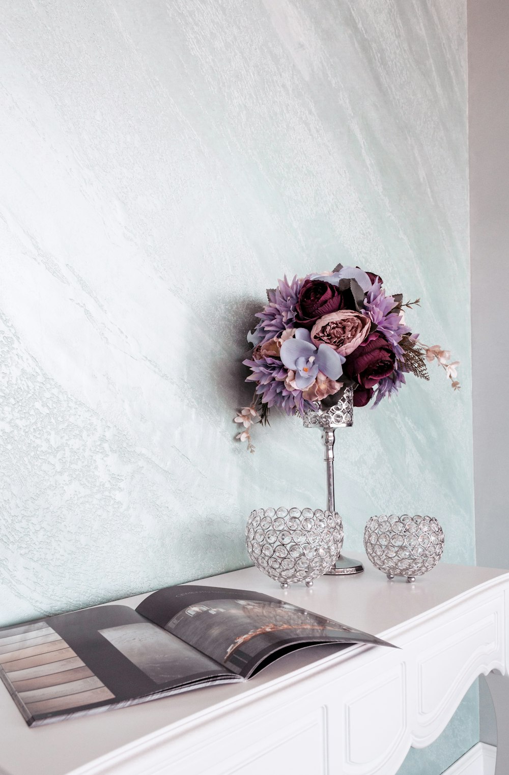 pink and white flowers in clear glass vase