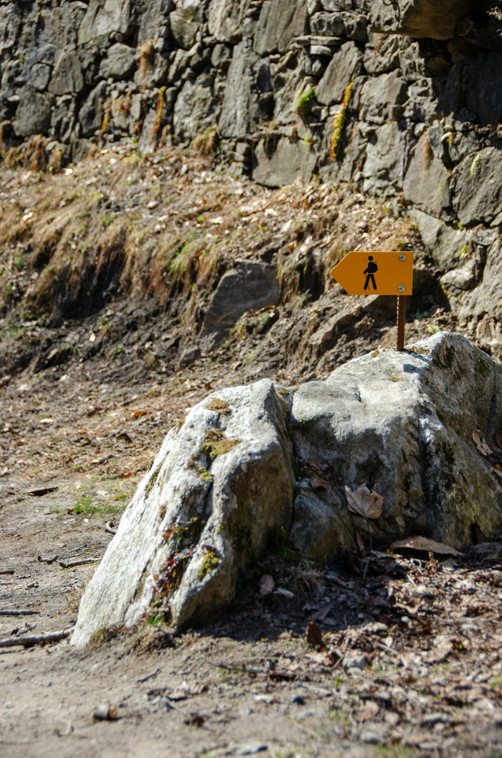 orange and white road sign