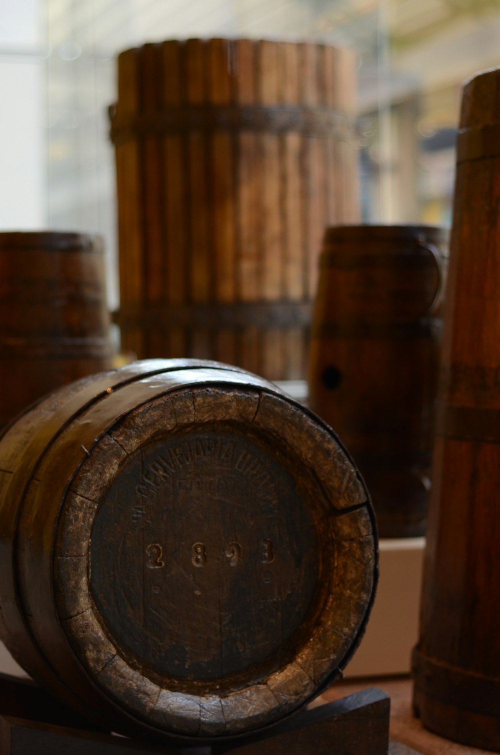 brown wooden barrels on brown wooden table