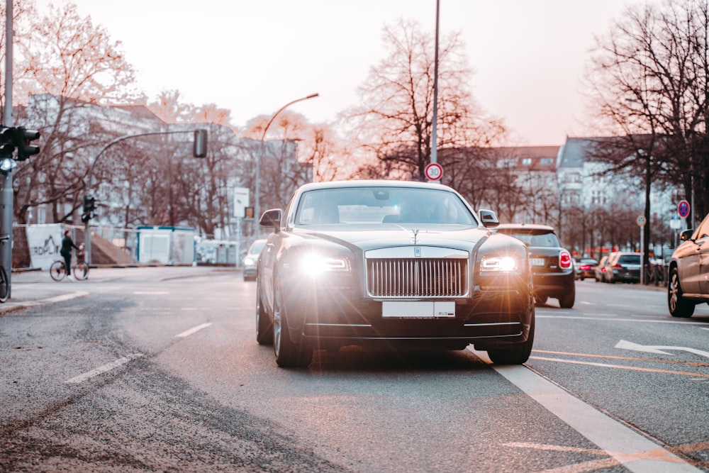 black car on road during daytime