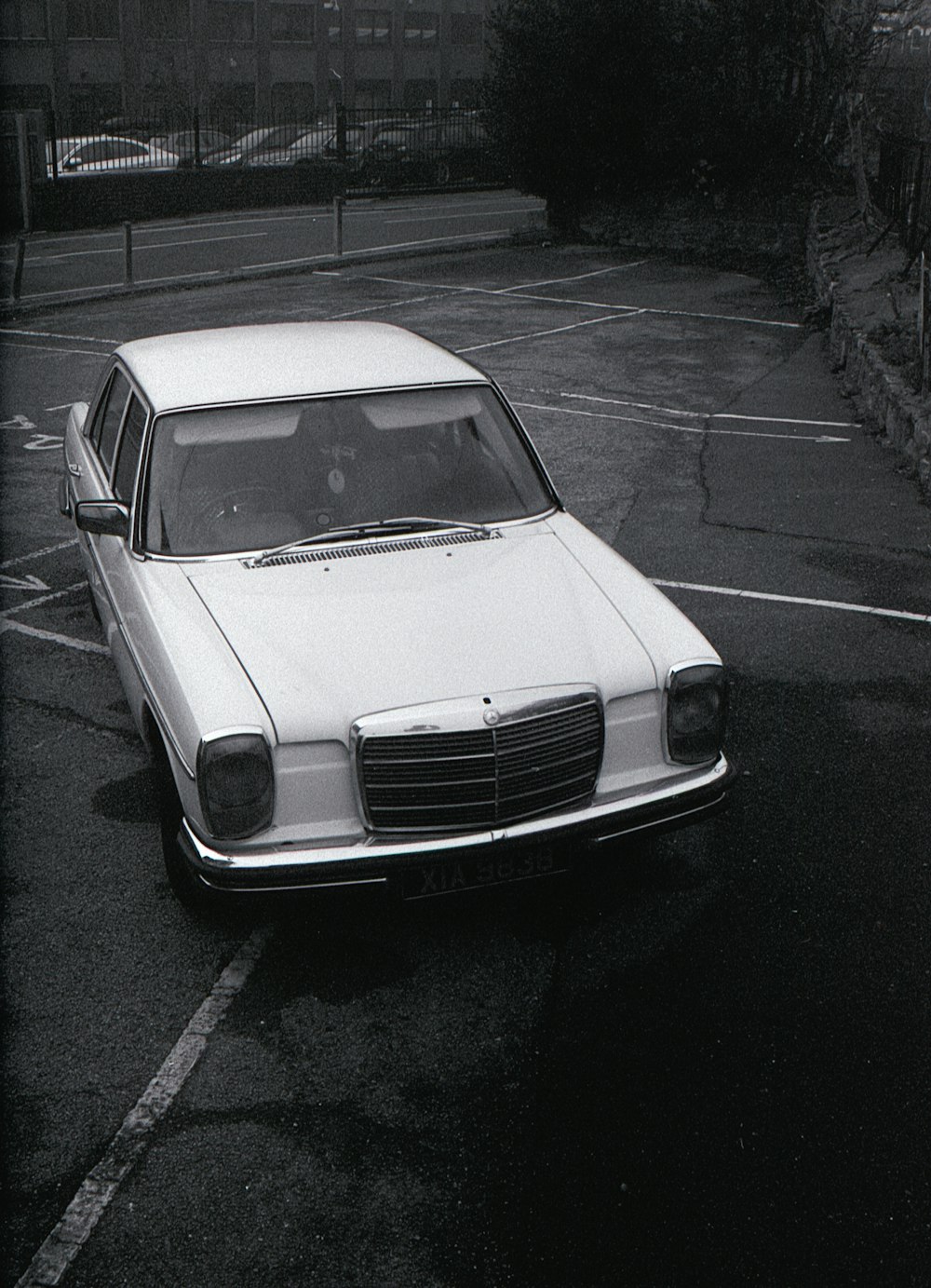 white mercedes benz coupe on road