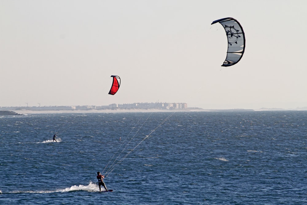 person surfing on sea during daytime