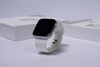 white and black apple watch
