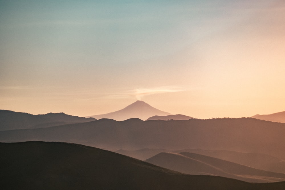 silhouette of mountains during daytime