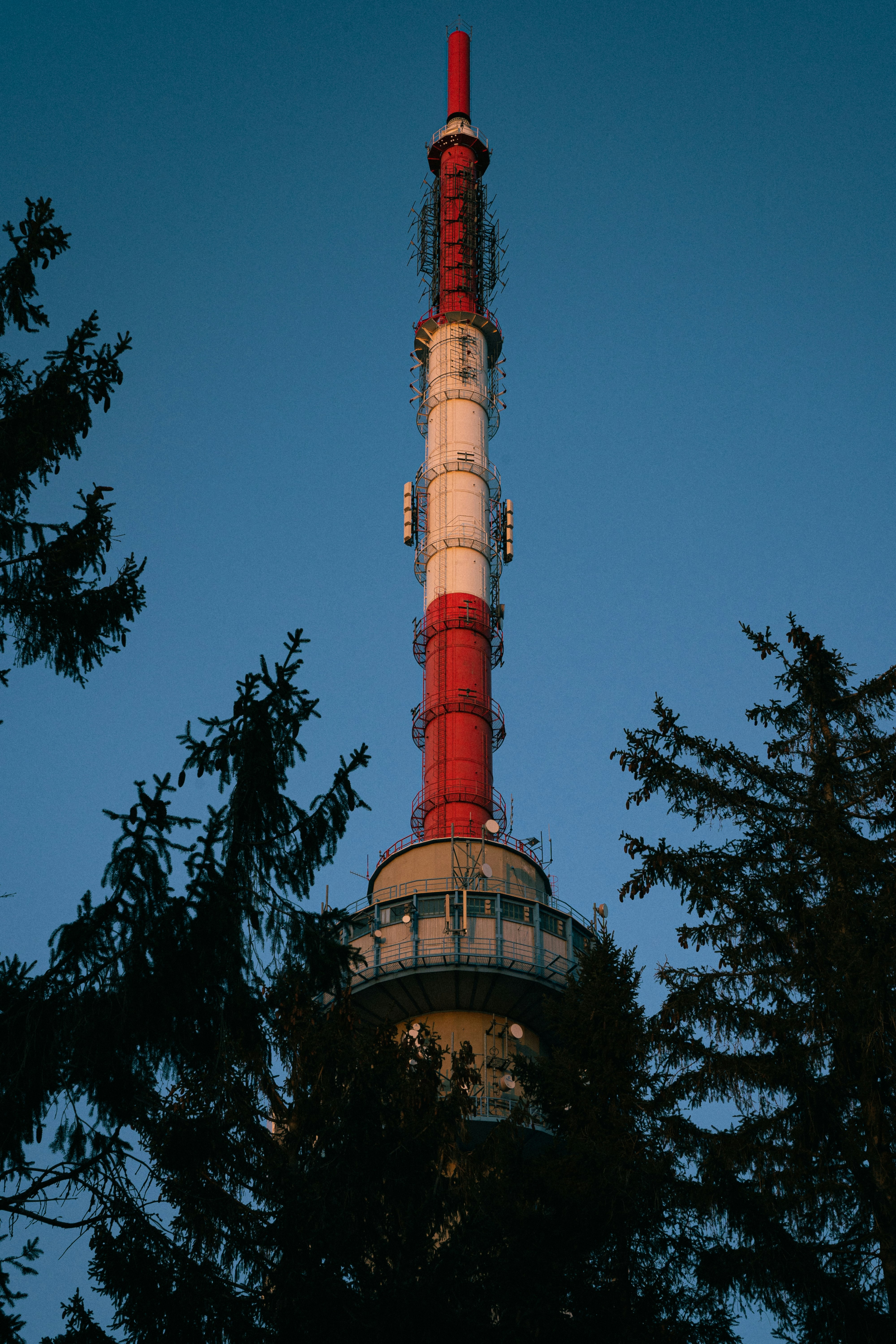 white and red tower under blue sky during daytime